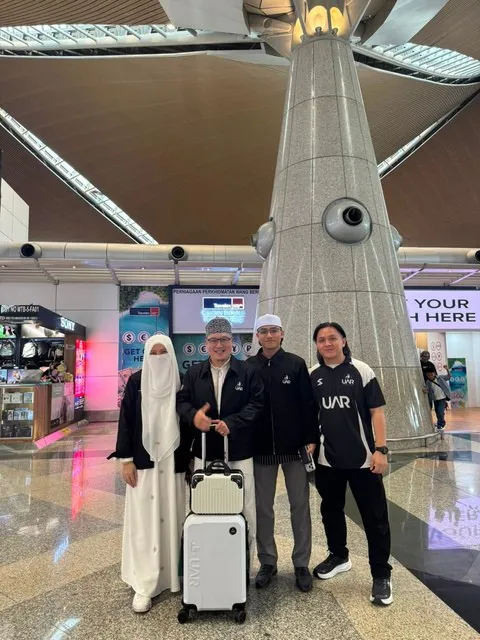 Pasukan UAR bersama jemaah sebelum berlepas di KLIA